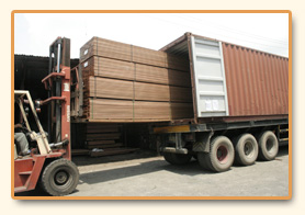 Forklift loading sawn stock onto a truck.